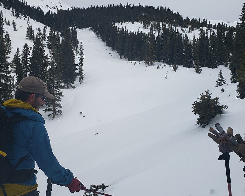 Roger Coit discussing the technical aspects of avalanche paths.